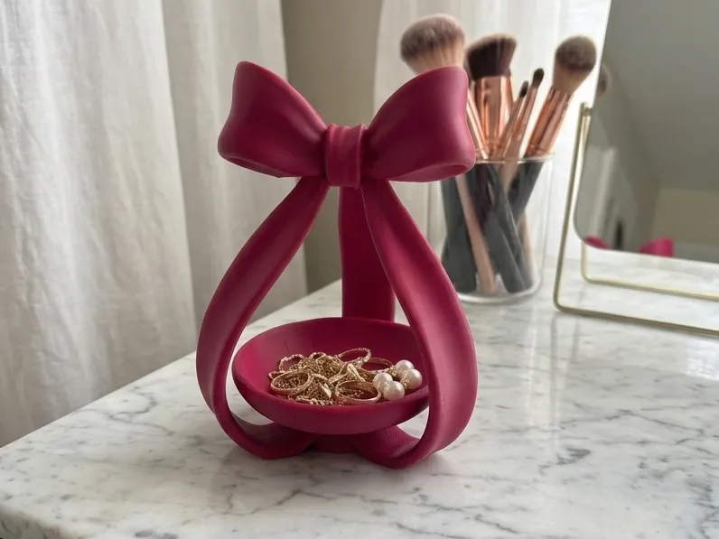 Coquette Bow Jewellery Dish — example colour. Includes: One finished printed item; display accessories excluded. Approximate dimensions (Width × Depth × Height): 1 supplied: 134 × 127.2 × 181.4 mm.