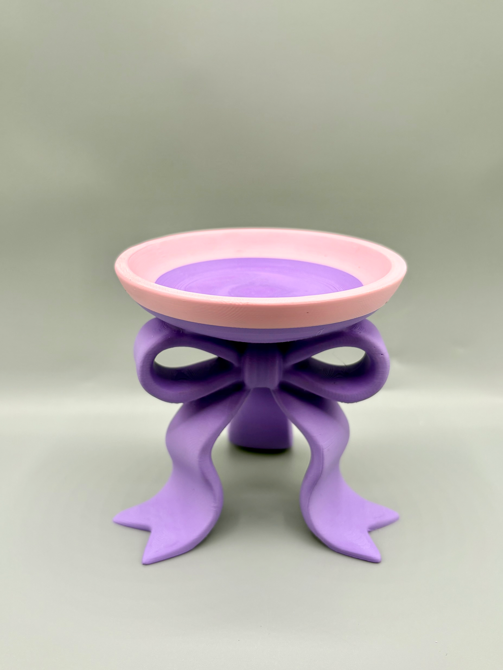 Sculptural Ribbon Bow Jewellery Tray — example colour. Includes: One finished printed item; display accessories excluded. Approximate dimensions (Width × Depth × Height): 1 supplied: 111.4 × 108.2 × 101.6 mm.