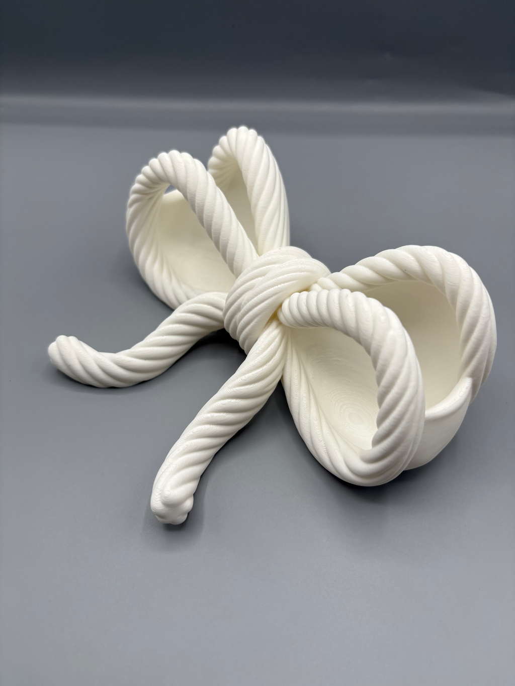 Rope Bow Double Jewellery Dish — example colour. Includes: One finished printed item; display accessories excluded. Approximate dimensions (Width × Depth × Height): 1 supplied: 157 × 114.3 × 63.5 mm.