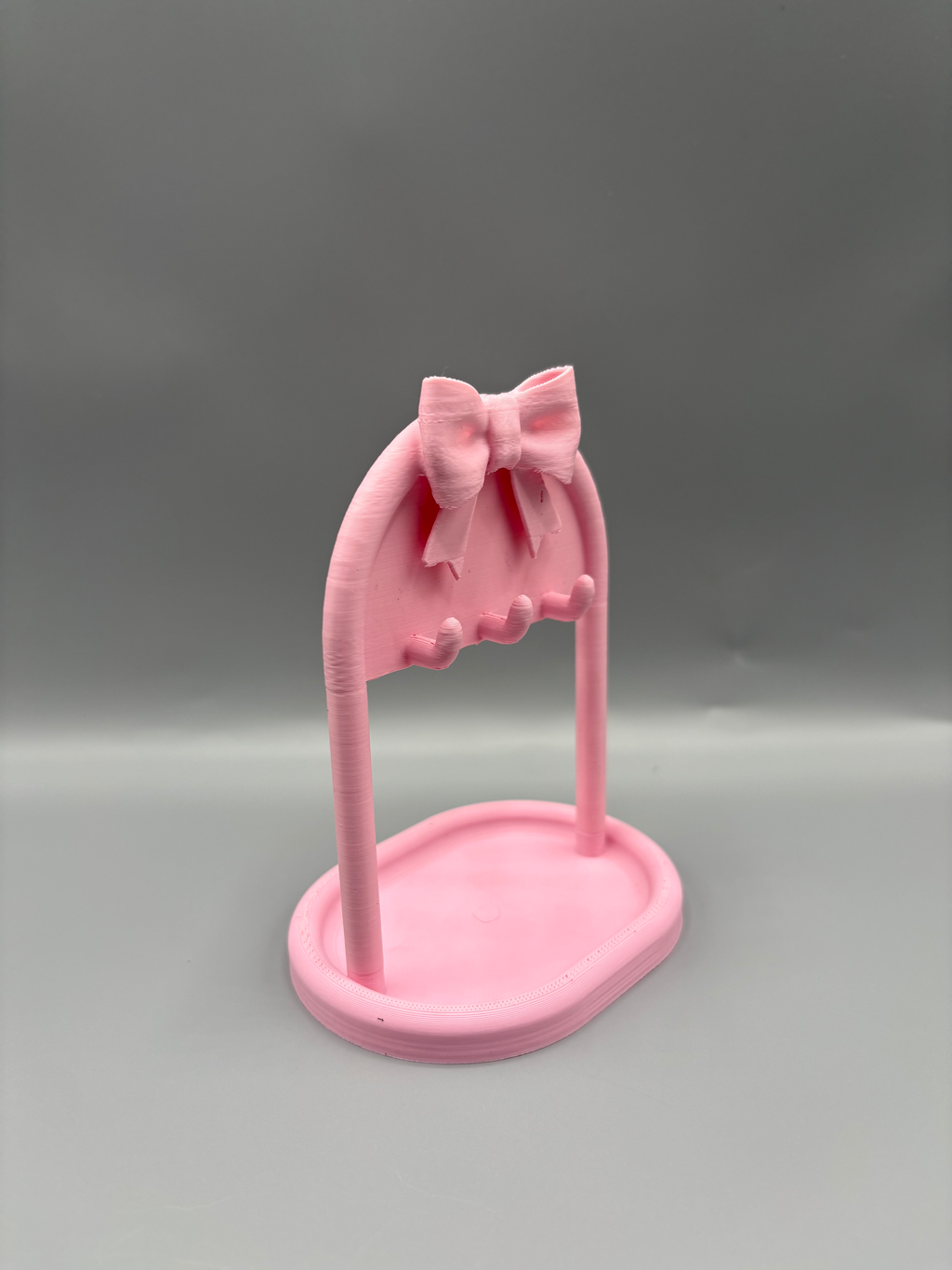 Bow Necklace Stand & Jewellery Tray — example colour. Includes: One finished printed item; display accessories excluded. Approximate dimensions (Width × Depth × Height): 1 supplied: 132 × 114.3 × 165.1 mm.
