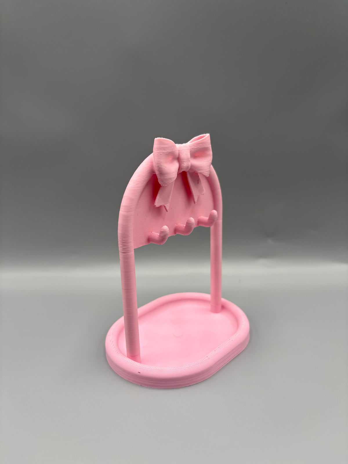 Bow Necklace Stand & Jewellery Tray — example colour. Includes: One finished printed item; display accessories excluded. Approximate dimensions (Width × Depth × Height): 1 supplied: 132 × 114.3 × 165.1 mm.