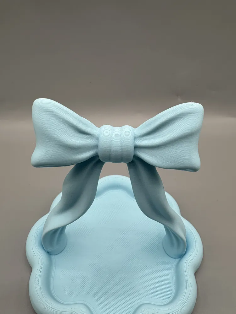 Ribbon Bow Stand & Scalloped Jewellery Tray — example colour. Includes: One finished item supplied; display accessories are excluded. Approximate dimensions (Width × Depth × Height): 1 supplied: 144.5 × 143.6 × 139.7 mm.