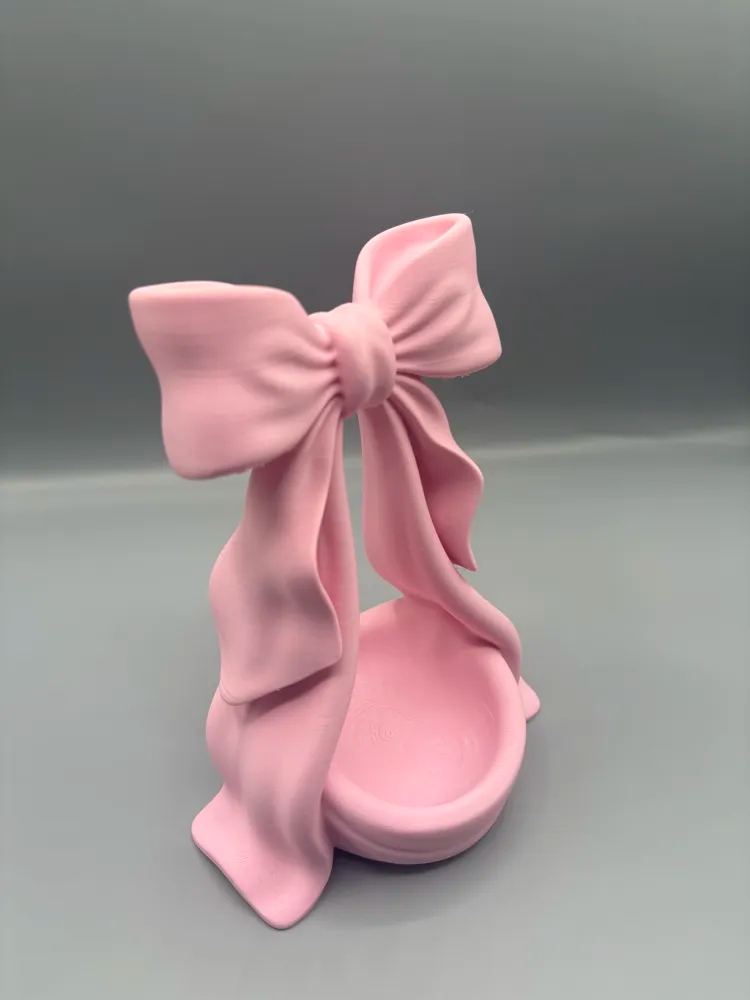 Bow Jewellery Stand & Ring Dish — example colour. Includes: One finished item supplied; display accessories are excluded. Approximate dimensions (Width × Depth × Height): 1 supplied: 123.4 × 86.4 × 165.1 mm.