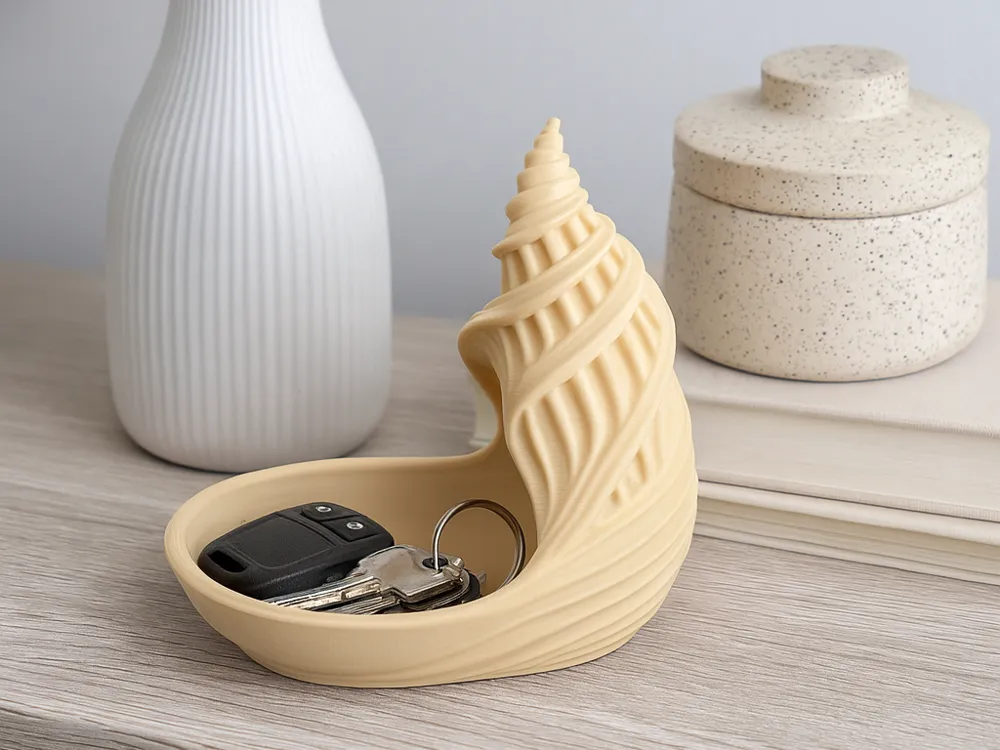 Spiral Seashell Entryway Catchall Tray — example colour. Includes: One finished item supplied; display accessories are excluded. Approximate dimensions (Width × Depth × Height): 1 supplied: 153.8 × 108.8 × 152.4 mm.