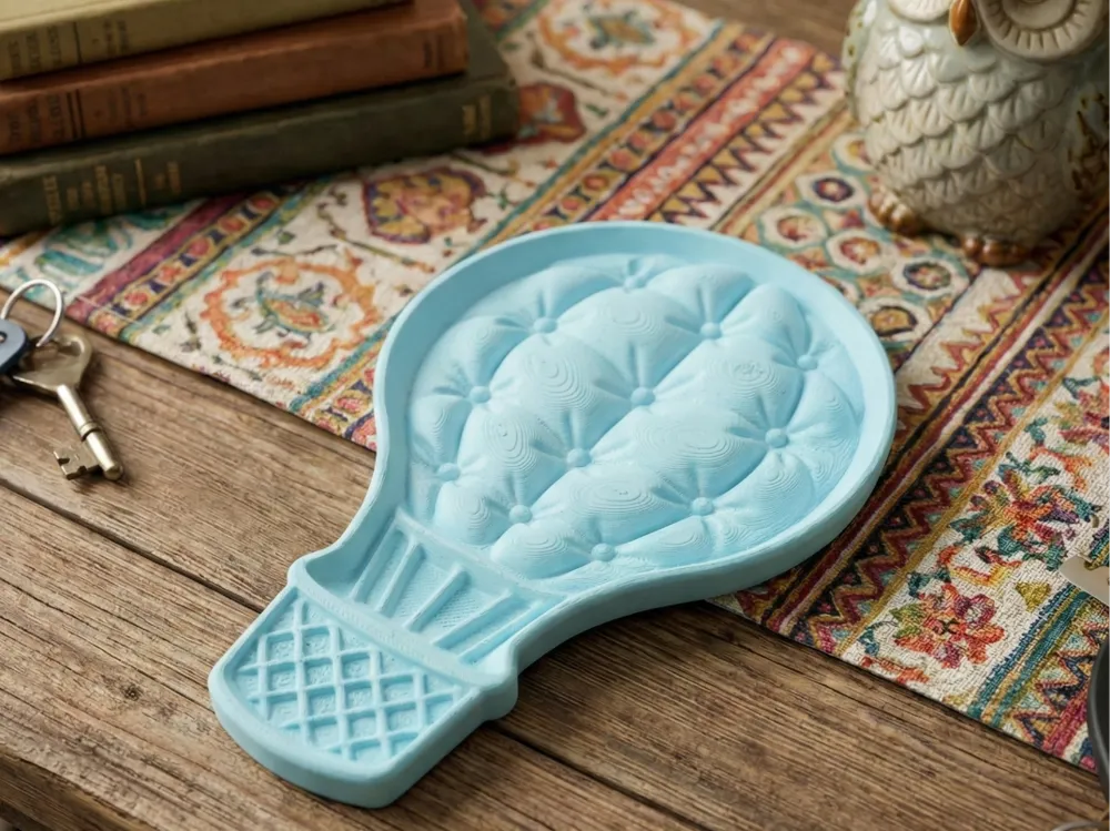 Quilted Hot Air Balloon Catchall Tray — example colour. Includes: One finished item supplied; display accessories are excluded. Approximate dimensions (Width × Depth × Height): 1 supplied: 190.5 × 127.4 × 17.8 mm.