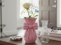 Sculptural Ribbon Bow Decorative Vase — example colour. Includes: One finished item supplied; display accessories are excluded. Approximate dimensions (Width × Depth × Height): 1 supplied: 91 × 88.9 × 165.1 mm.