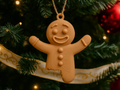 Bitten Gingerbread Man Christmas Ornament — example colour. Includes: One finished item supplied; display accessories are excluded. Approximate dimensions (Width × Depth × Height): 1 supplied: 101.6 × 89.6 × 15.2 mm.