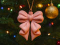 Puffy Ribbon Bow Hanging Ornament — example colour. Includes: One finished item supplied; display accessories are excluded. Approximate dimensions (Width × Depth × Height): 1 supplied: 101.6 × 82.1 × 20.3 mm.