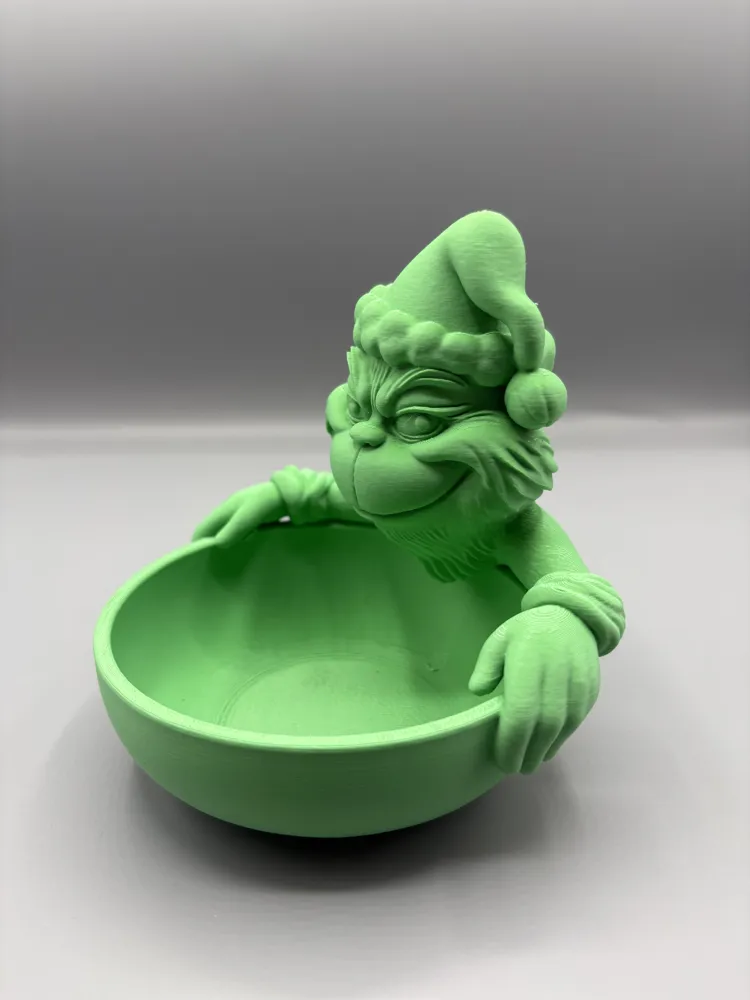 Grinch Holiday Catchall Bowl — example colour. Includes: One finished item supplied; display accessories are excluded. Approximate dimensions (Width × Depth × Height): 1 supplied: 130.2 × 116.9 × 127 mm.