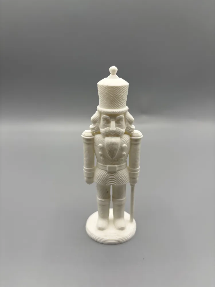 Minimalist Nutcracker Decorative Figurine — example colour. Includes: One finished item supplied; display accessories are excluded. Approximate dimensions (Width × Depth × Height): 1 supplied: 53 × 48 × 152.4 mm.