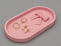 Sculpted Bow Oval Jewellery Tray — example colour. Includes: One finished item supplied; display accessories are excluded. Approximate dimensions (Width × Depth × Height): 1 supplied: 177.8 × 96.6 × 23.6 mm.
