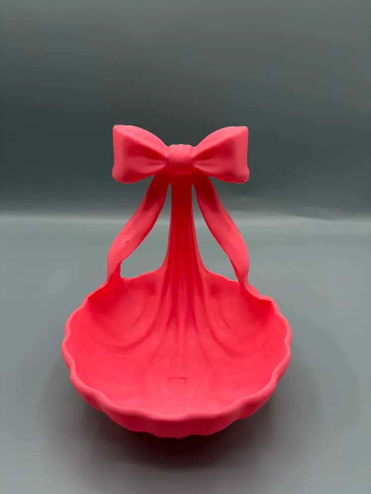 Draping Bow Jewellery Catchall Tray — example colour. Includes: One finished item supplied; display accessories are excluded. Approximate dimensions (Width × Depth × Height): 1 supplied: 110 × 109.7 × 127 mm.