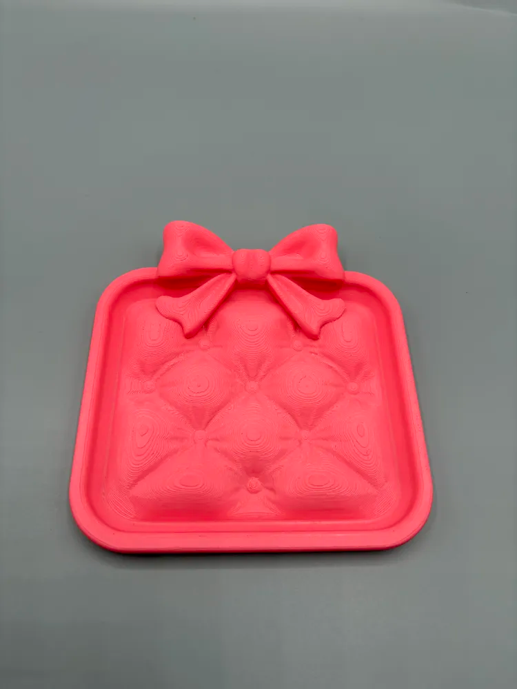 Quilted Bow Accent Jewellery Tray — example colour. Includes: One finished item supplied; display accessories are excluded. Approximate dimensions (Width × Depth × Height): 1 supplied: 159.1 × 152.4 × 25.8 mm.
