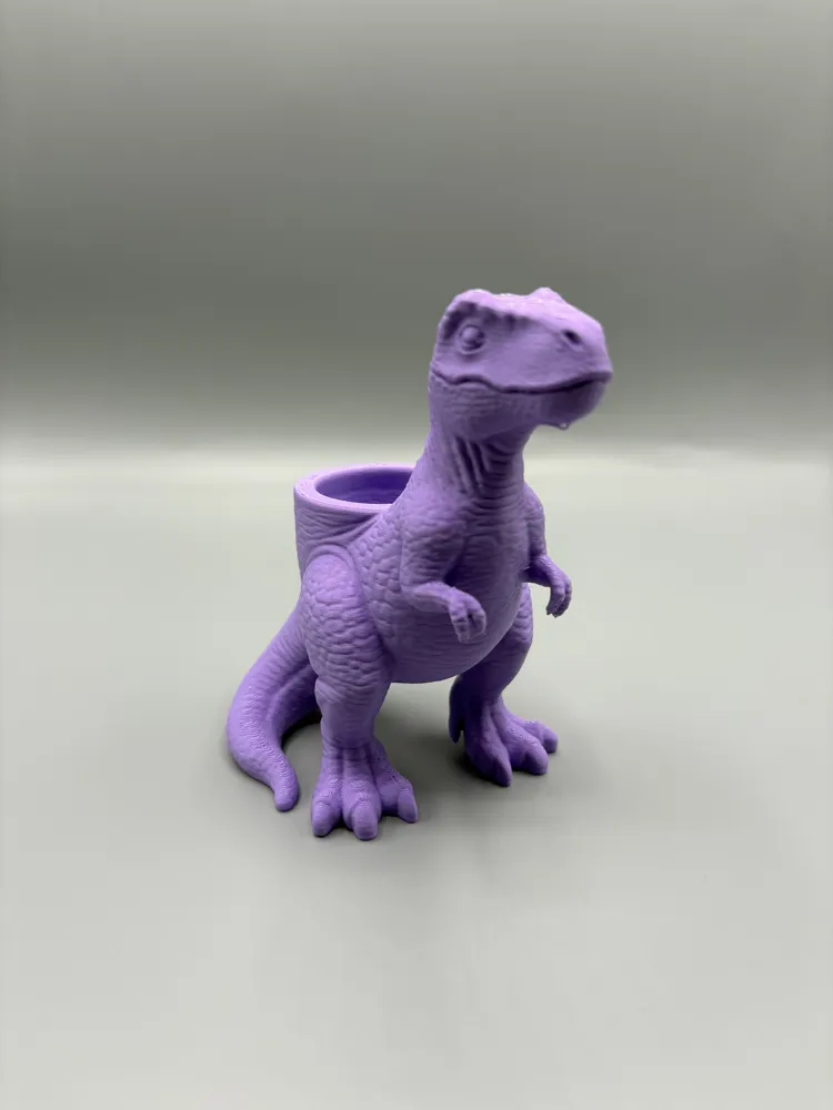 T-Rex Dinosaur Decorative Planter — example colour. Includes: One finished item supplied; display accessories are excluded. Approximate dimensions (Width × Depth × Height): 1 supplied: 162 × 115 × 177.6 mm.