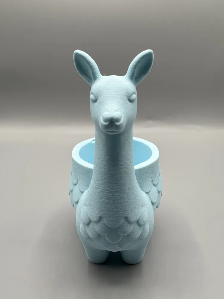 Llama Decorative Succulent Planter — example colour. Includes: One finished item supplied; display accessories are excluded. Approximate dimensions (Width × Depth × Height): 1 supplied: 77.5 × 50.8 × 98.8 mm.