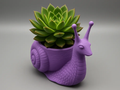 Snail Decorative Succulent Planter — example colour. Includes: One finished item supplied; display accessories are excluded. Approximate dimensions (Width × Depth × Height): 1 supplied: 155.1 × 90.9 × 152.4 mm.
