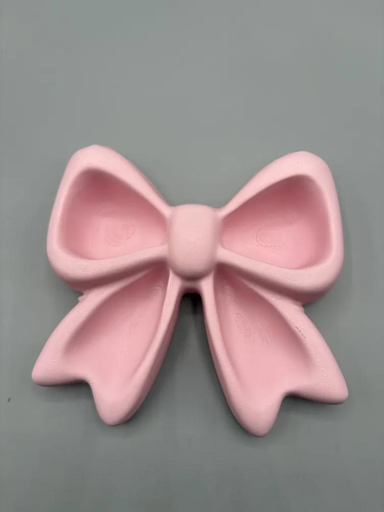 Coquette Ribbon Jewellery Tray — example colour. Includes: One finished item supplied; display accessories are excluded. Approximate dimensions (Width × Depth × Height): 1 supplied: 152.4 × 147.2 × 38.1 mm.