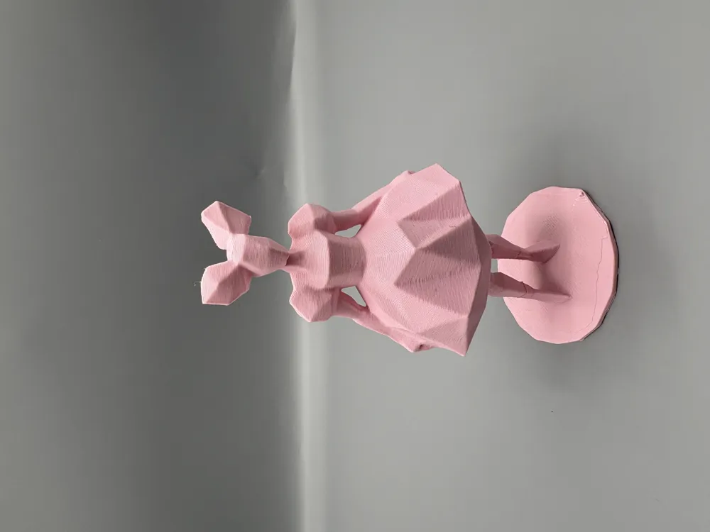 Low-Poly Couture Decorative Figurine — example colour. Includes: One finished item supplied; display accessories are excluded. Approximate dimensions (W × D × H): • Low-Poly Couture Decorative Figurine: 72.5 × 60.1 × 146.5 mm.