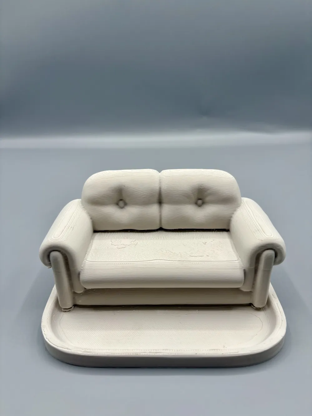 Mini Tufted Sofa Valet Tray — example colour. Includes: One finished item supplied; display accessories are excluded. Approximate dimensions (Width × Depth × Height): 1 supplied: 152.4 × 119 × 77.5 mm.