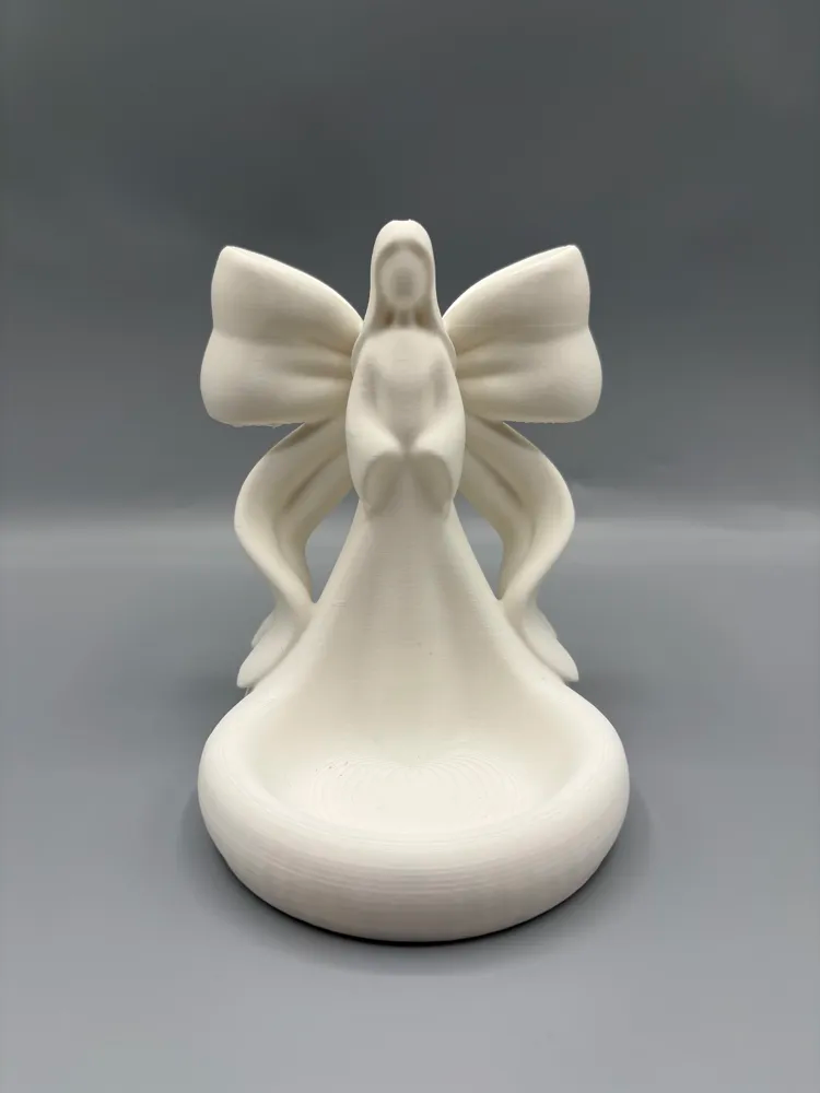 Ribbon Wing Angel LED Tea Light Holder — example colour. Includes: One finished item supplied; display accessories are excluded. Approximate dimensions (Width × Depth × Height): 1 supplied: 104.4 × 88.9 × 106.7 mm.
