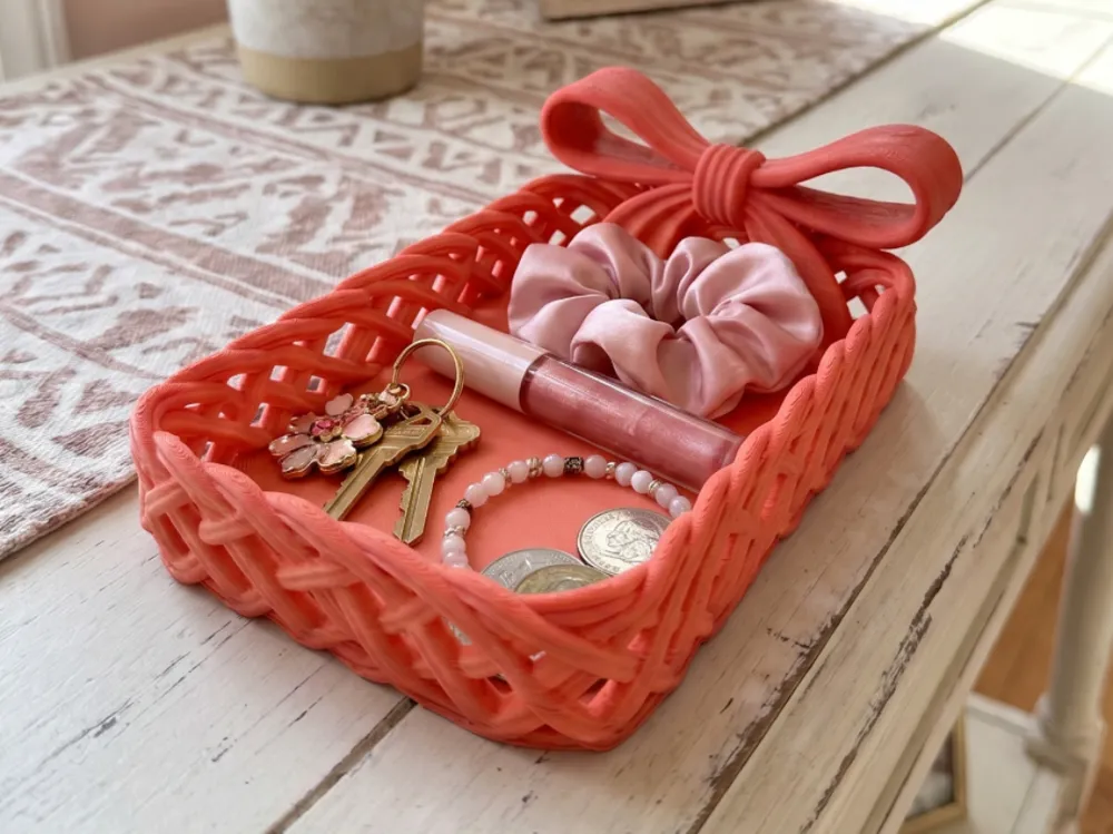 Woven Bow Jewellery Catchall Tray — example colour. Includes: One finished item supplied; display accessories are excluded. Approximate dimensions (Width × Depth × Height): 1 supplied: 203.2 × 132.8 × 63.7 mm.