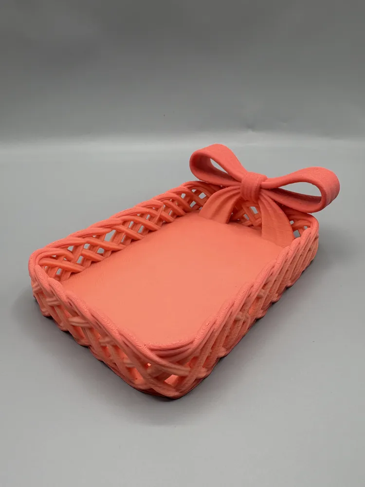 Woven Bow Jewellery Catchall Tray — example colour. Includes: One finished item supplied; display accessories are excluded. Approximate dimensions (Width × Depth × Height): 1 supplied: 203.2 × 132.8 × 63.7 mm.