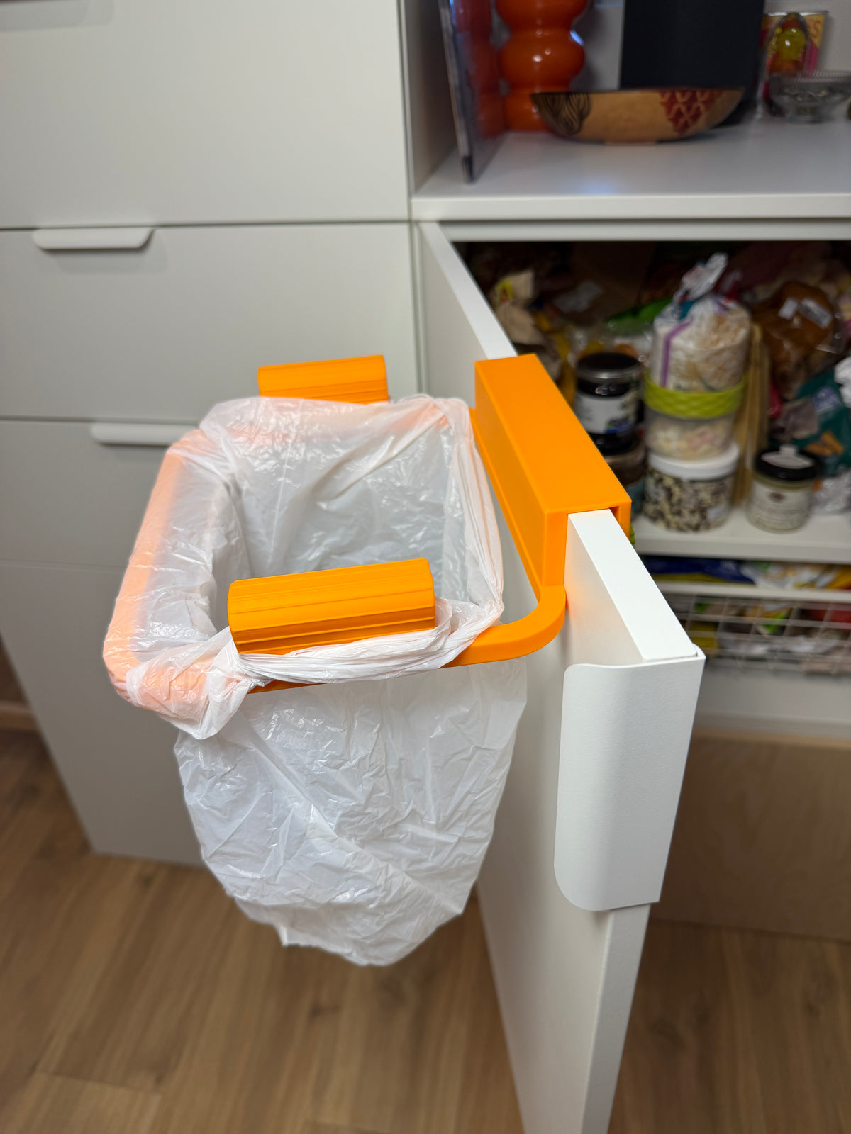 Trash Bag Holder — example colour. Includes: 1 holder frame and 2 printed clamping screws. Approximate dimensions (Width × Depth × Height): 1 supplied: 234.2 × 205 × 45.2 mm; 2 supplied: 13.8 × 13.8 × 19.3 mm.