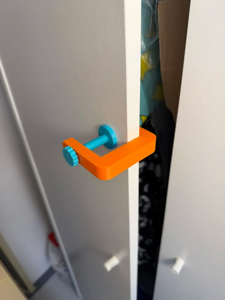Universal Door Stopper — example colour. Includes: one universal door stopper. Approximate dimensions (Width × Depth × Height): 1 supplied: 72.5 × 65 × 15 mm; 1 supplied: 20.3 × 20.3 × 50.3 mm; 1 supplied: 27.6 × 27.6 × 5 mm.