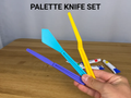 Palette Knife Set — example colour. Includes: one palette knife set. Approximate dimensions (W × D × H): • Wide palette spatula: 172.7 × 34.3 × 5.6 mm. • Straight palette knife: 173 × 15 × 5.6 mm. • Angled palette knife: 183.3 × 15.8 × 15 mm.
