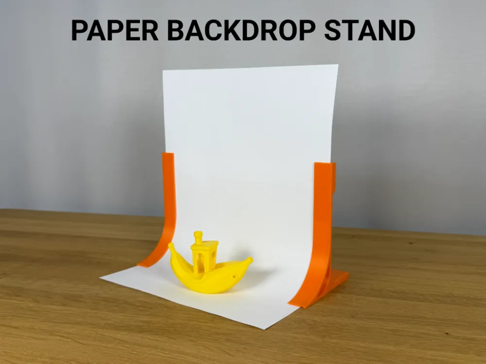 Photo Paper Backdrop Stand (A4) — example colour. Includes: one photo paper backdrop stand (a4). Approximate dimensions (Width × Depth × Height): 2 supplied: 18 × 95 × 125 mm; 2 supplied: 301 × 24 × 2.8 mm; 2 supplied: 214 × 24 × 2.8 mm.