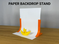 Photo Paper Backdrop Stand (A4) — example colour. Includes: one photo paper backdrop stand (a4). Approximate dimensions (Width × Depth × Height): 2 supplied: 18 × 95 × 125 mm; 2 supplied: 301 × 24 × 2.8 mm; 2 supplied: 214 × 24 × 2.8 mm.