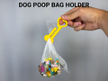 Dog Poop Bag Holder — example colour. Includes: one dog poop bag holder. Approximate dimensions (Width × Depth × Height): 1 supplied: 99.9 × 38.1 × 6 mm.