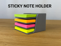 Sticky Note / Post-it Holder — example colour. Includes: one sticky note / post-it holder.