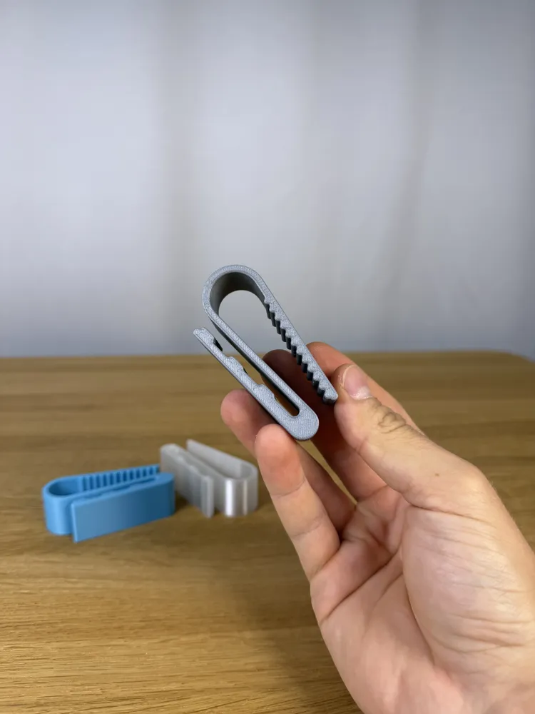 Car Visor Sunglasses Clip — example colour. Includes: one car visor sunglasses clip.