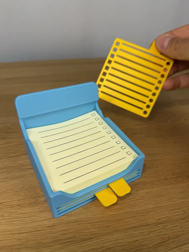 Sticky Note / Post-it Holder with Stencils — example colour. Includes: One complete printed item in the selected configuration. Approximate dimensions (Width × Depth × Height): 1 supplied: 83.4 × 83.3 × 65.5 mm; 3 supplied: 76 × 90 × 1.6 mm.
