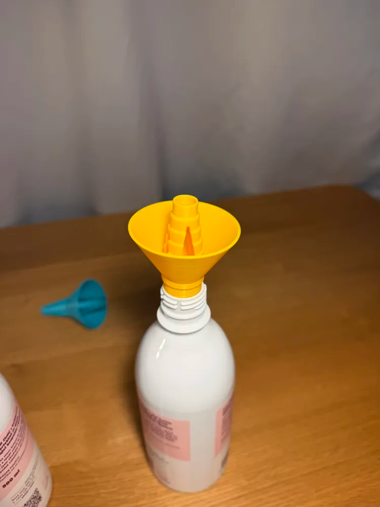 Liquid Transfer Funnel — example colour. Includes: one liquid transfer funnel. Approximate dimensions (W × D × H): • Liquid Transfer Funnel: 59.1 × 59.1 × 85.7 mm.