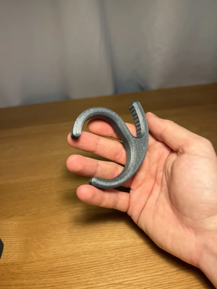 Desk Backpack Hanger — example colour. Includes: One complete printed item in the selected configuration. Approximate dimensions (Width × Depth × Height): 1 supplied: 15 × 86.3 × 76 mm.