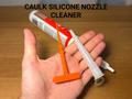 Caulk / Silicone Nozzle Cleaner - Pack of 5 — example colour. Includes: 5 nozzle cleaning tools. Approximate dimensions (W × D × H): • Caulk nozzle cleaner (each): 52.5 × 12.2 × 116.1 mm.