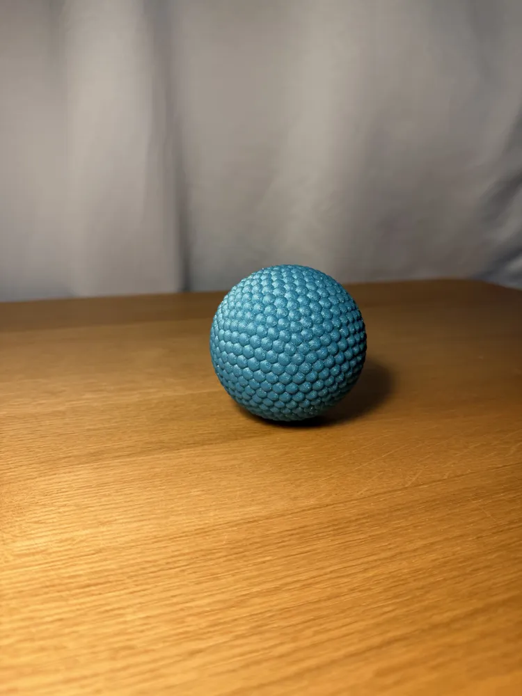 Sensory Fidget Sphere - Rounded — example colour. Includes: one sensory fidget sphere - rounded. Approximate dimensions (W × D × H): • Rounded sphere half A: 79.9 × 79.9 × 40 mm. • Rounded sphere half B: 80 × 80 × 40 mm. • Connector peg: 34.6 × 34.6 × 28.6 mm.