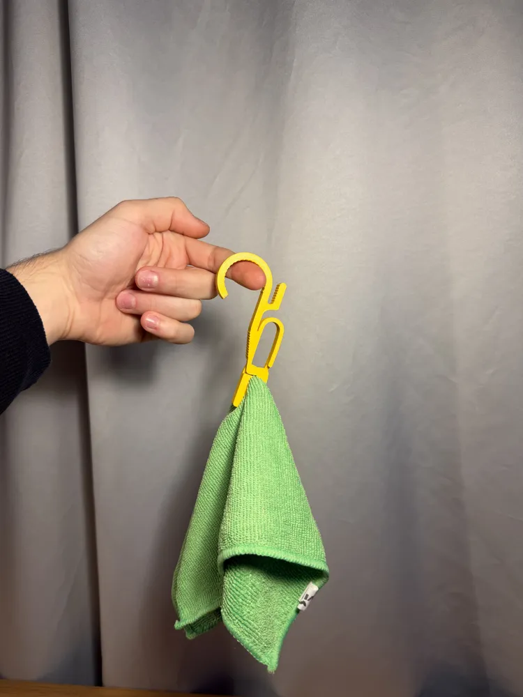 Clip Hanger — example colour. Includes: One complete printed item in the selected configuration. Approximate dimensions (Width × Depth × Height): 1 supplied: 61.7 × 9 × 113.7 mm.