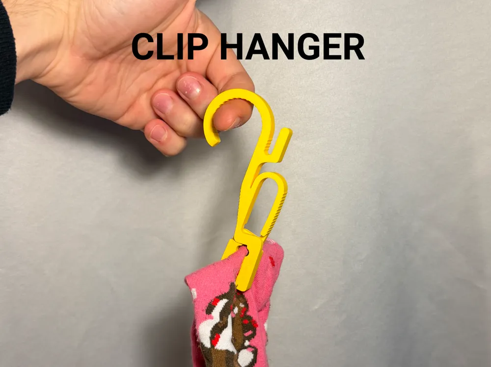 Clip Hanger — example colour. Includes: One complete printed item in the selected configuration. Approximate dimensions (Width × Depth × Height): 1 supplied: 61.7 × 9 × 113.7 mm.