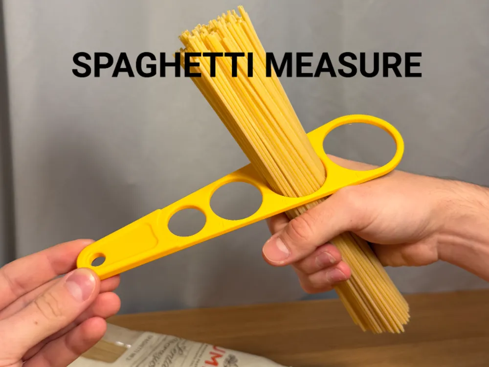 Spaghetti Measure — example colour. Includes: one spaghetti measure. Approximate dimensions (W × D × H): • Spaghetti Measure: 230.4 × 58.8 × 7 mm.