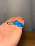 Mini Whistle - Pack of 10 — example photo. Pack contains ten printed whistles; pictured accessories are not included.