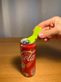Universal Can Opener With Cover — example colour. Includes: one universal can opener with cover. Approximate dimensions (W × D × H): • Universal Can Opener With Cover: 57.1 × 33.2 × 30.8 mm.