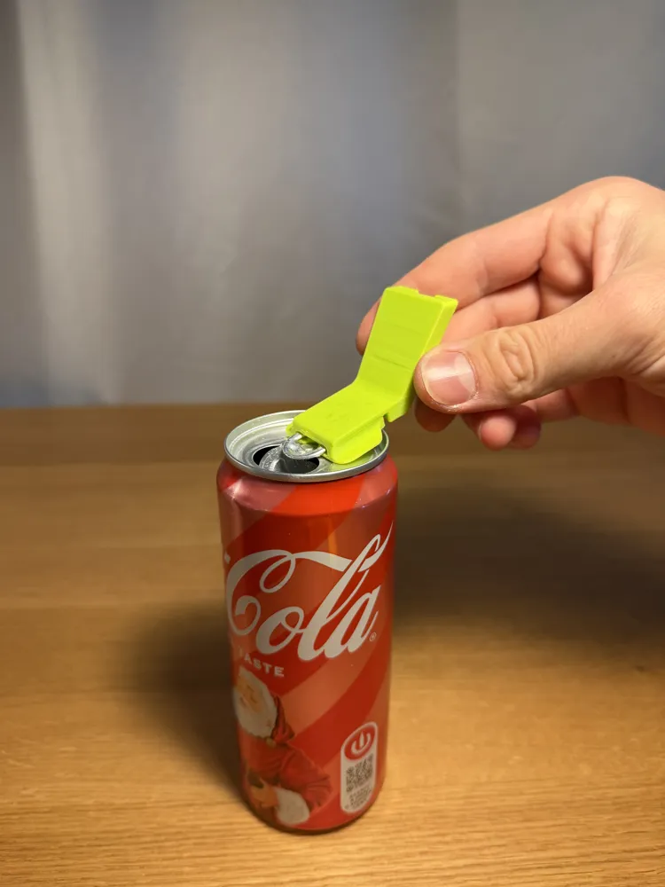 Universal Can Opener With Cover — example colour. Includes: one universal can opener with cover. Approximate dimensions (W × D × H): • Universal Can Opener With Cover: 57.1 × 33.2 × 30.8 mm.