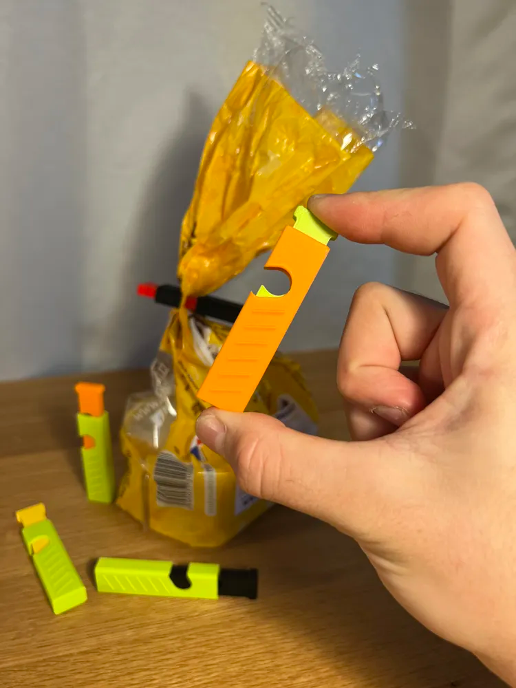 Squeeze-to-Lock Bag Clip - Pack of 5 — example colour. Includes: 5 printed pieces of the selected design. Approximate dimensions (Width × Depth × Height): 5 supplied: 89.2 × 16.8 × 6.4 mm; 5 supplied: 65 × 16.8 × 11.4 mm.