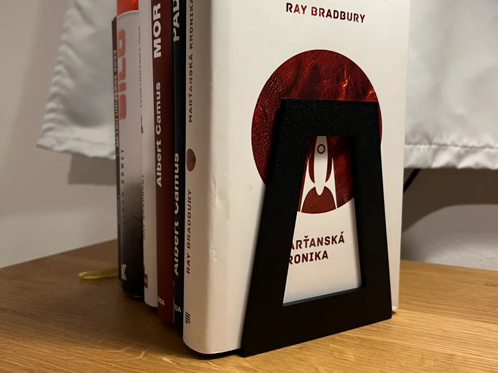 Bookend Stand V3 — example colour. Includes: One complete printed item in the selected configuration. Approximate dimensions (Width × Depth × Height): 1 supplied: 90 × 108 × 135 mm.