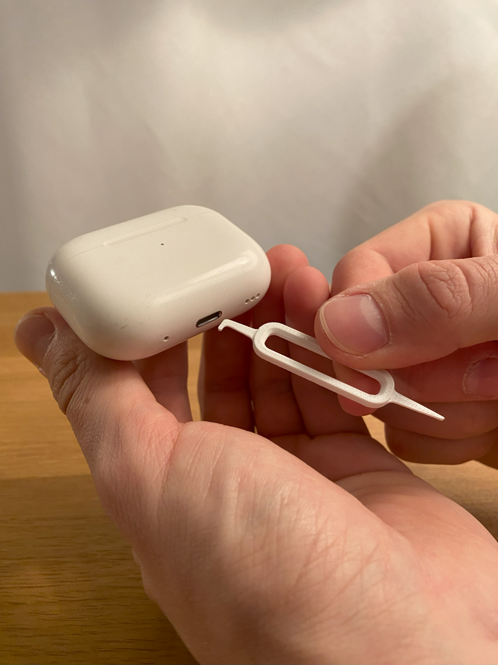 Printed charger port tool shown with an example charging case